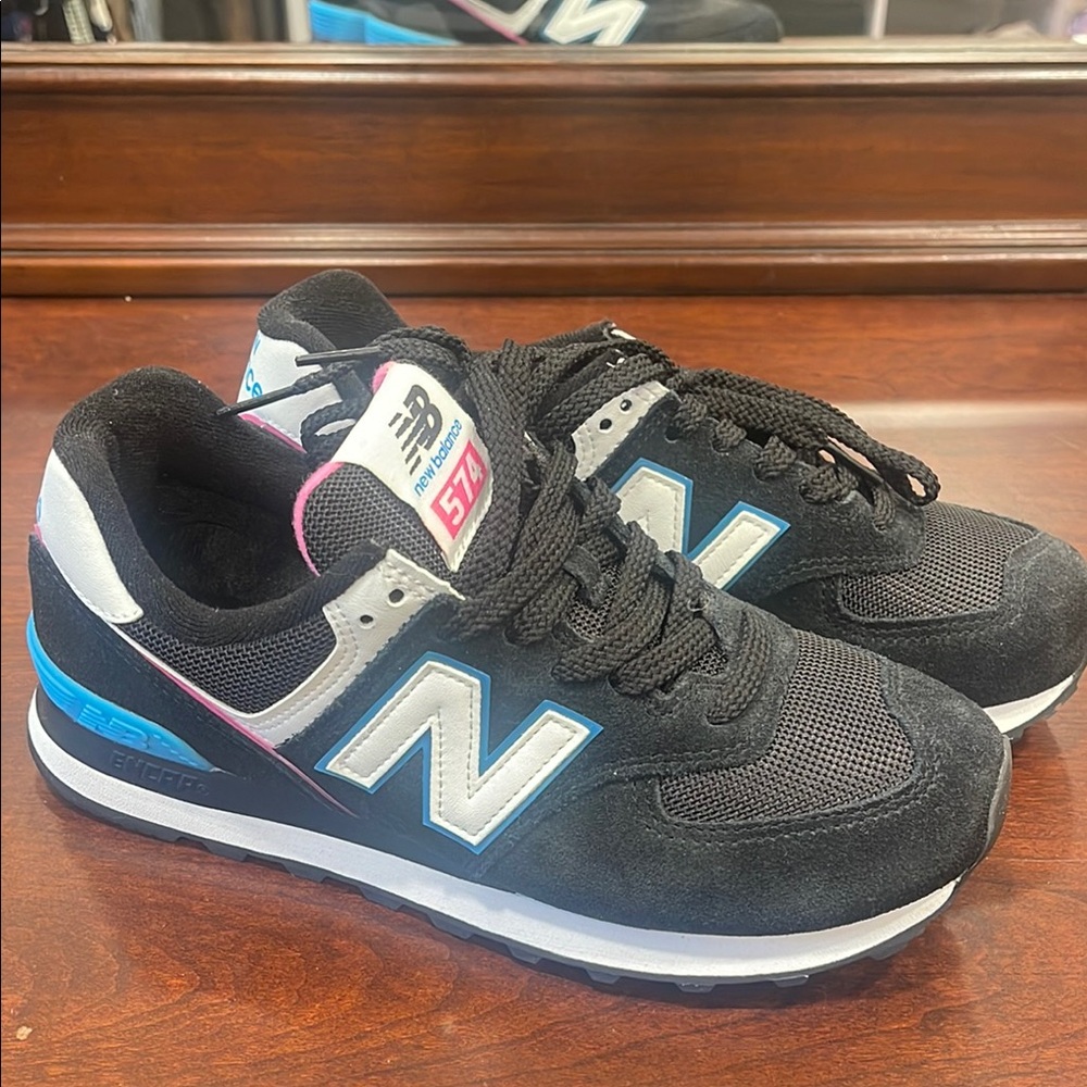 New Balance Black Sneakers with Blue and White Accents